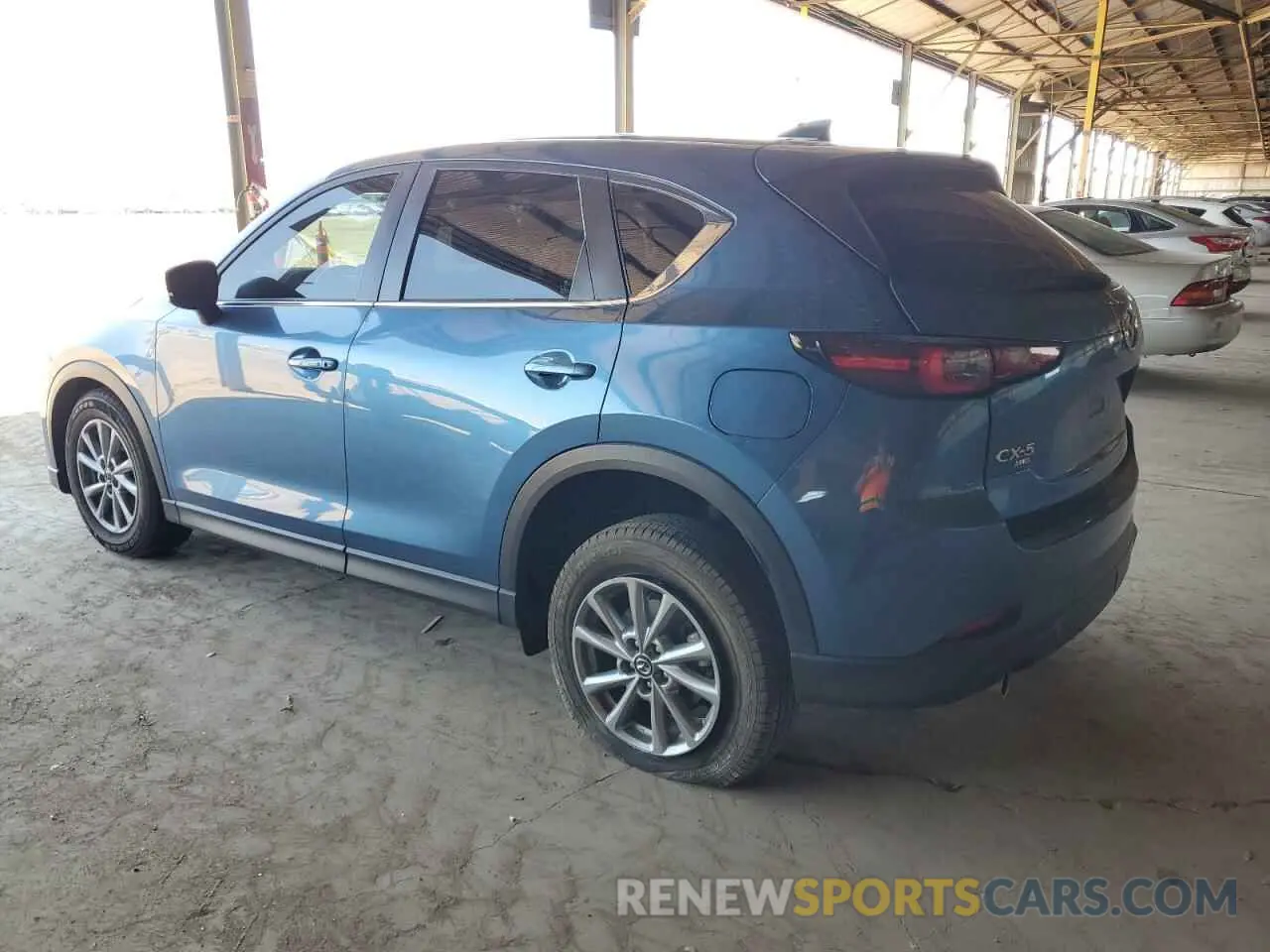 2 fotografías del automóvil dañado JM3KFBCM3P0140899 MAZDA CX-5 PREFE 2023