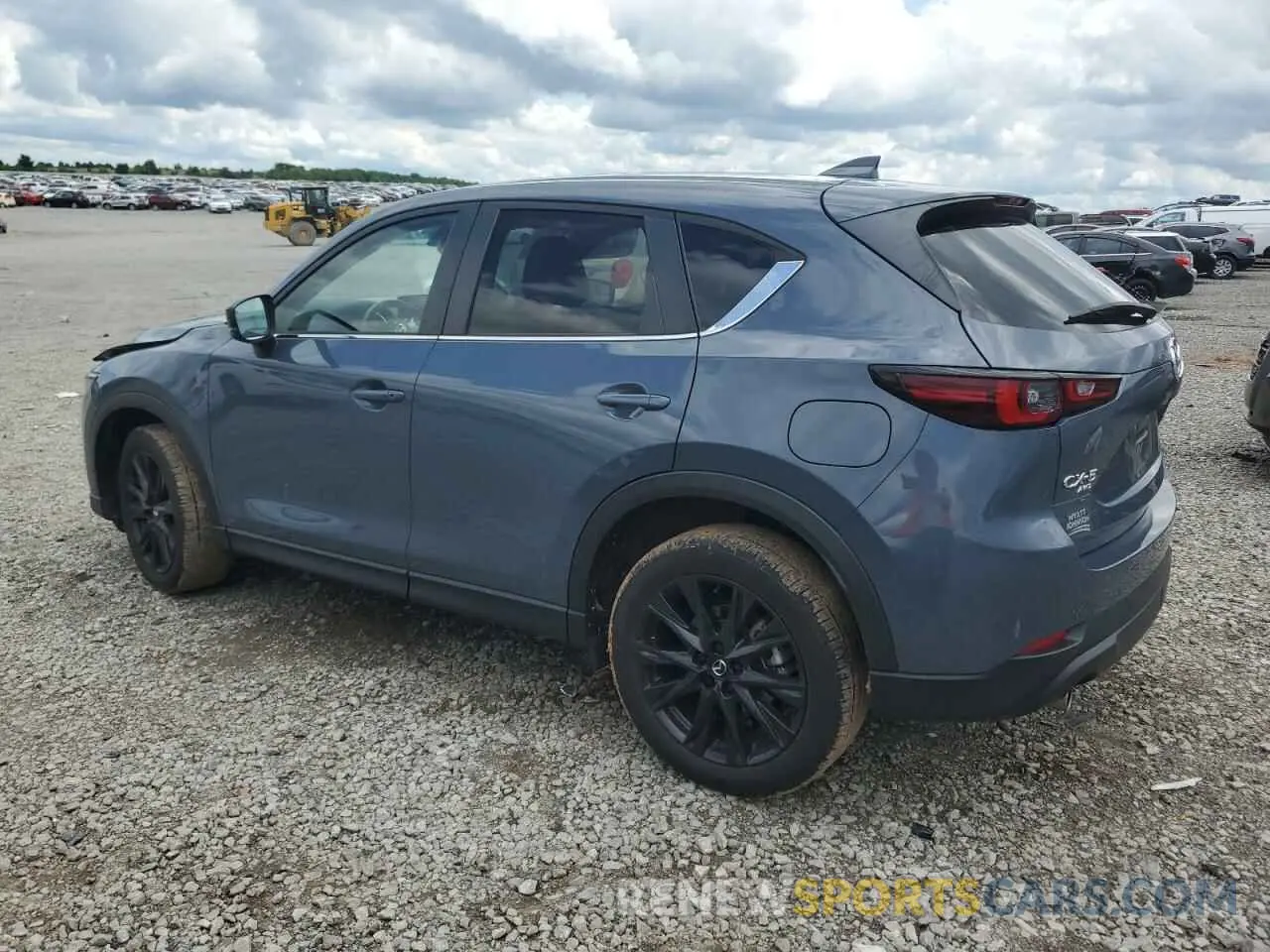 2 fotografías del automóvil dañado JM3KFBCM4P0215089 MAZDA CX-5 PREFE 2023