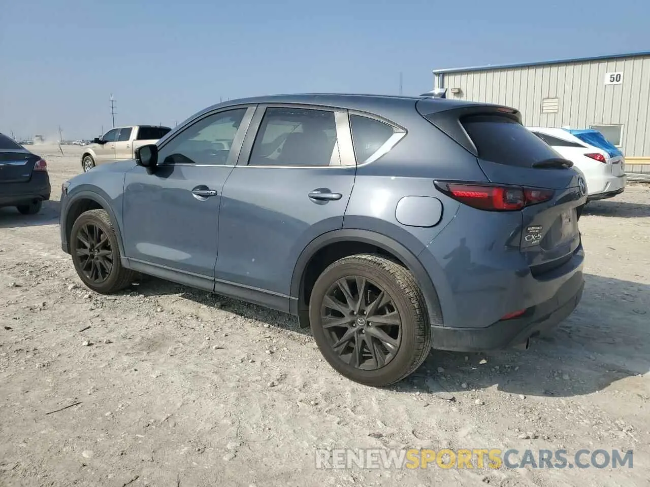 2 fotografías del automóvil dañado JM3KFBCM4P0277706 MAZDA CX-5 PREFE 2023