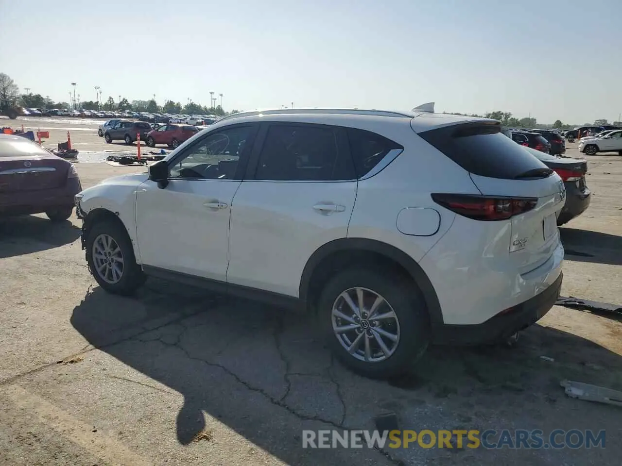2 fotografías del automóvil dañado JM3KFBCM4P0289631 MAZDA CX-5 PREFE 2023