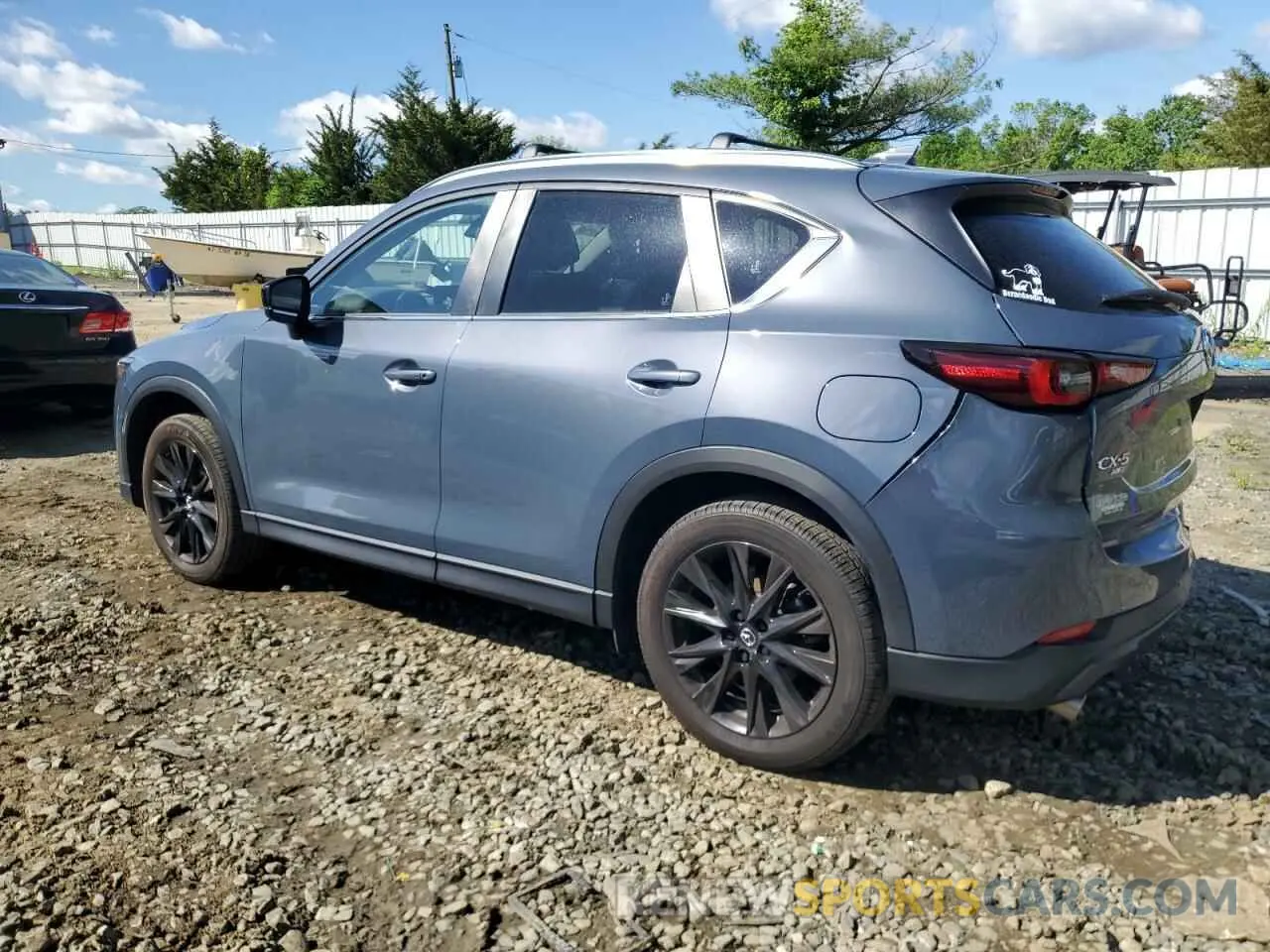 2 fotografías del automóvil dañado JM3KFBCM9P0110080 MAZDA CX-5 PREFE 2023