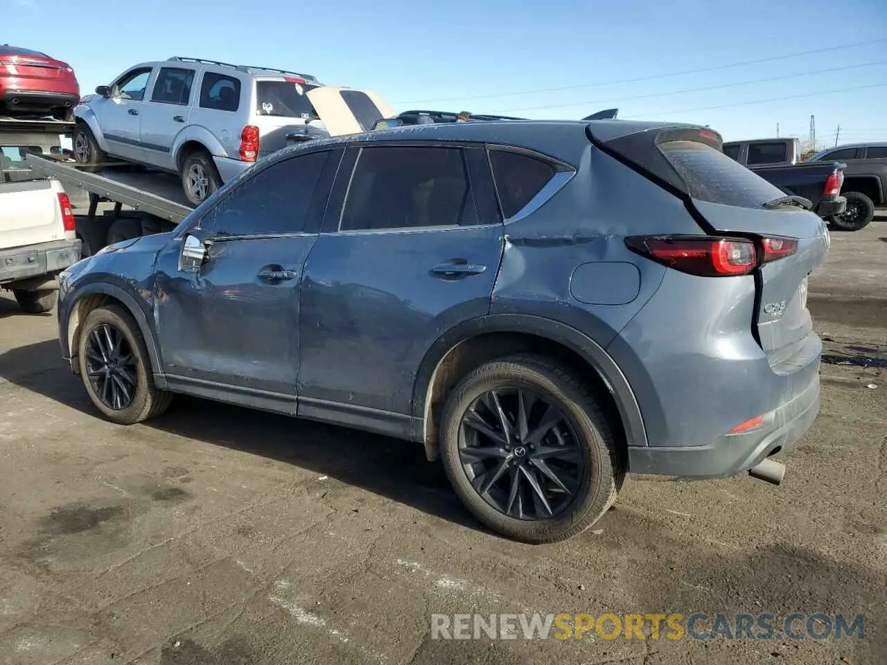 2 fotografías del automóvil dañado JM3KFBCMXP0195656 MAZDA CX-5 PREFE 2023