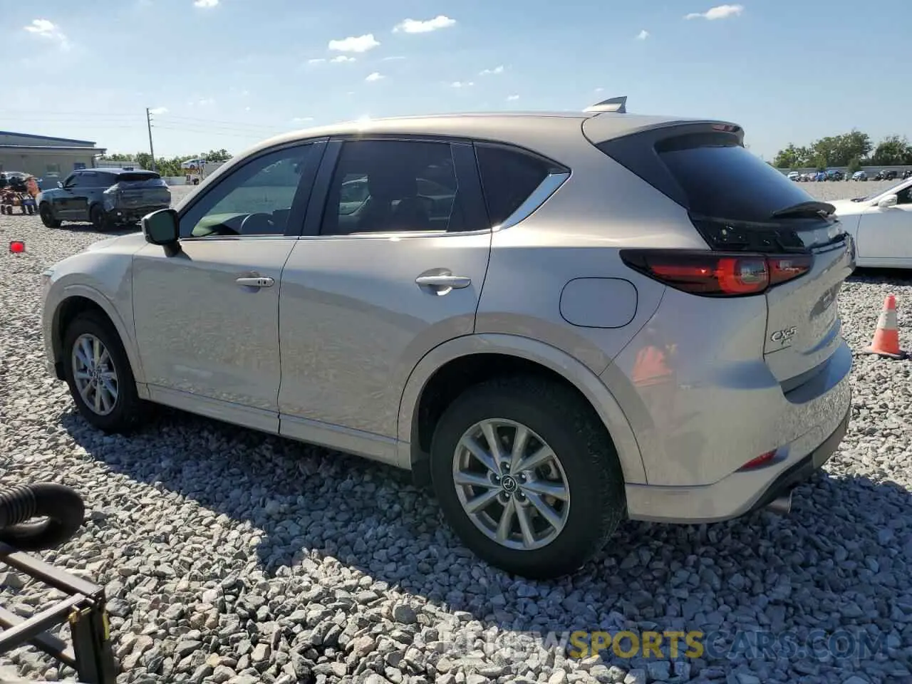 2 fotografías del automóvil dañado JM3KFBCL9R0434429 MAZDA CX-5 PREFE 2024