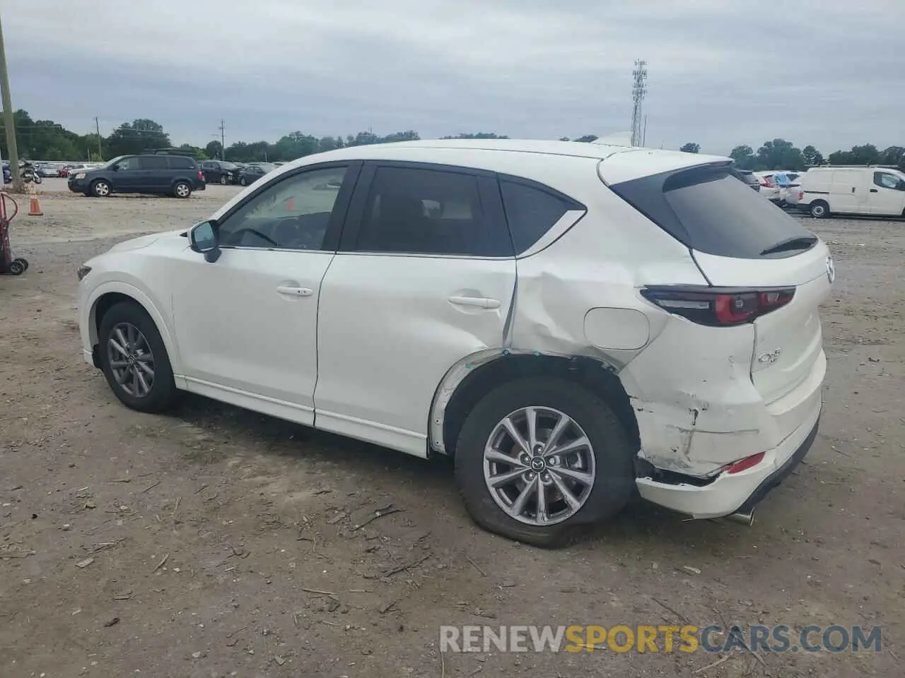 2 fotografías del automóvil dañado JM3KFBCM2R0373482 MAZDA CX-5 PREFE 2024