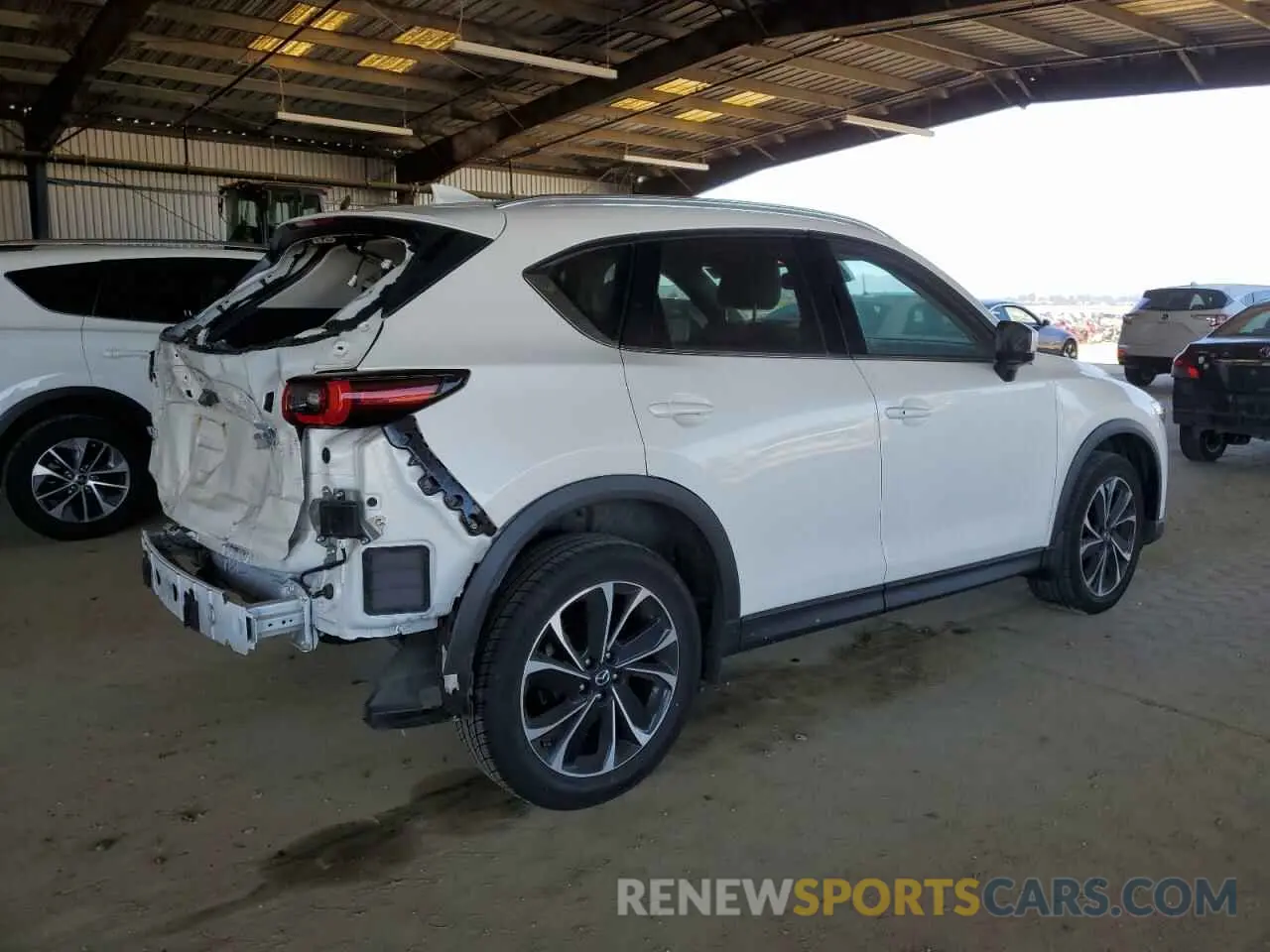 3 fotografías del automóvil dañado JM3KFBEM0N1602467 MAZDA CX-5 PREMI 2022