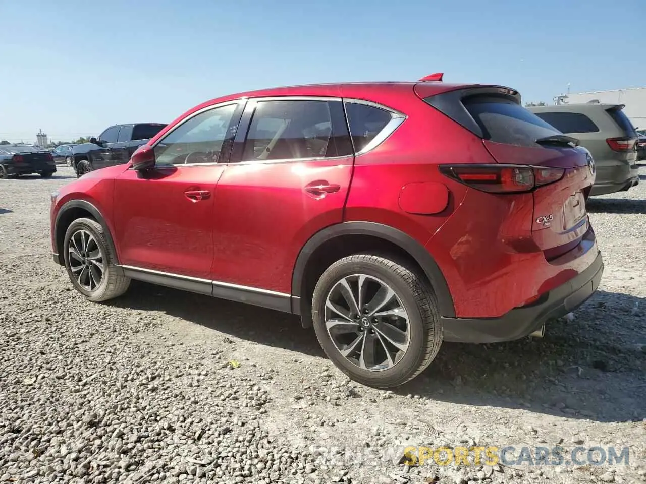 2 fotografías del automóvil dañado JM3KFBDM0P0268693 MAZDA CX-5 PREMI 2023
