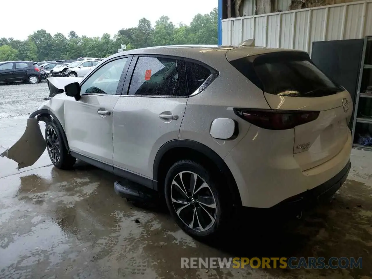 2 fotografías del automóvil dañado JM3KFBDM6P0210040 MAZDA CX-5 PREMI 2023