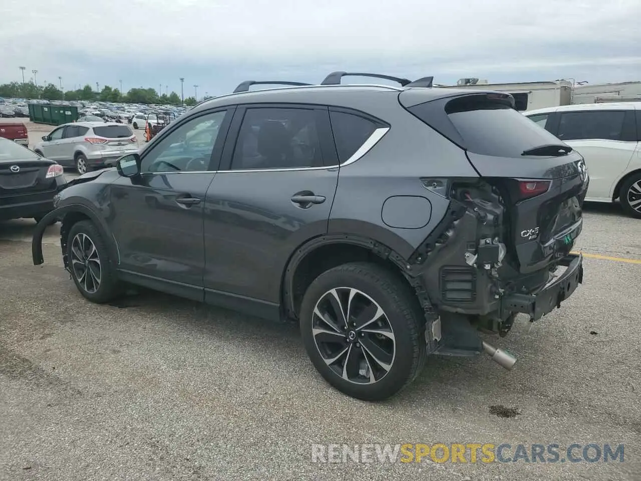 2 fotografías del automóvil dañado JM3KFBDM9P0198417 MAZDA CX-5 PREMI 2023