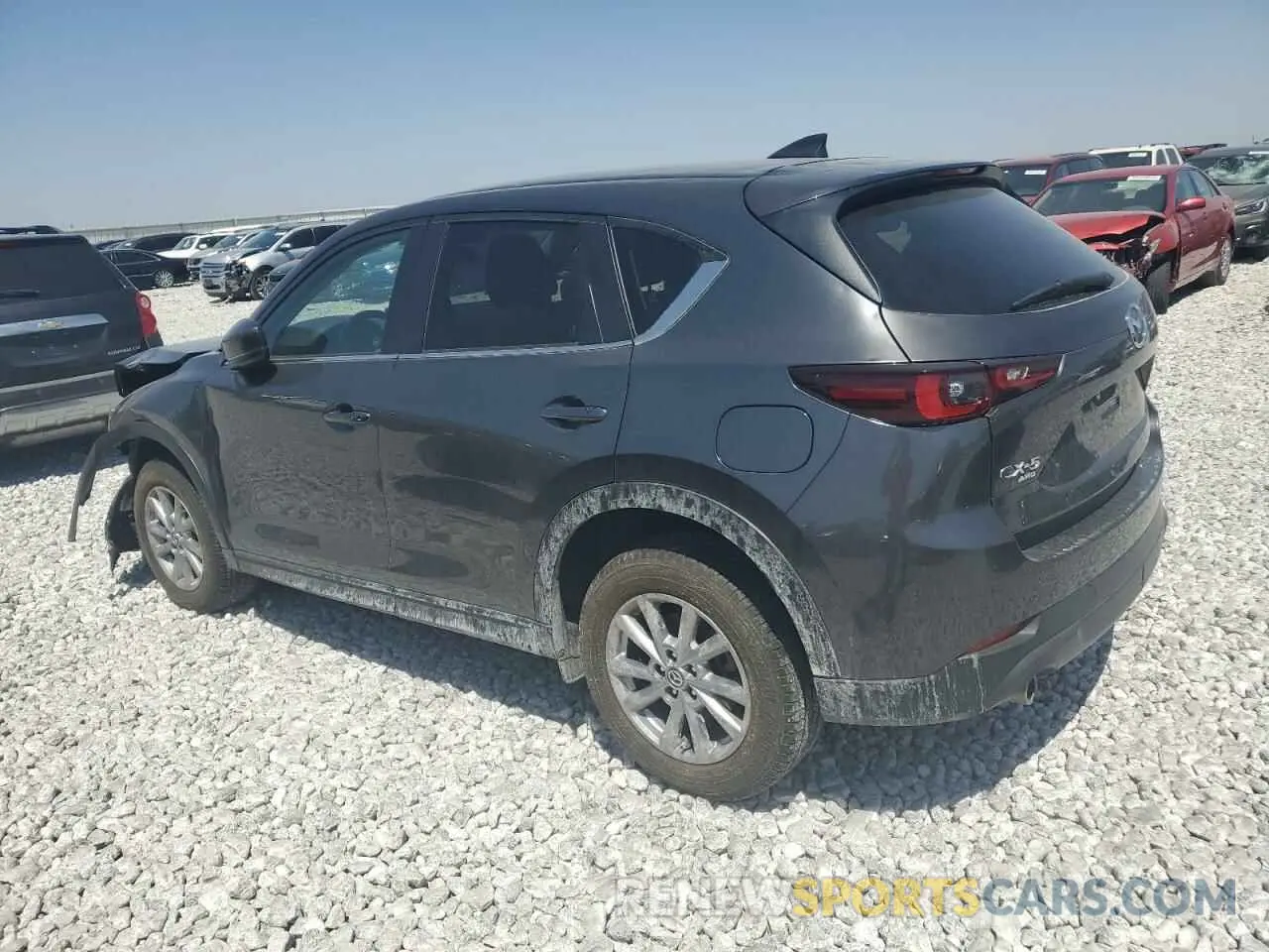 2 fotografías del automóvil dañado JM3KFBBM0N0625998 MAZDA CX-5 SELEC 2022