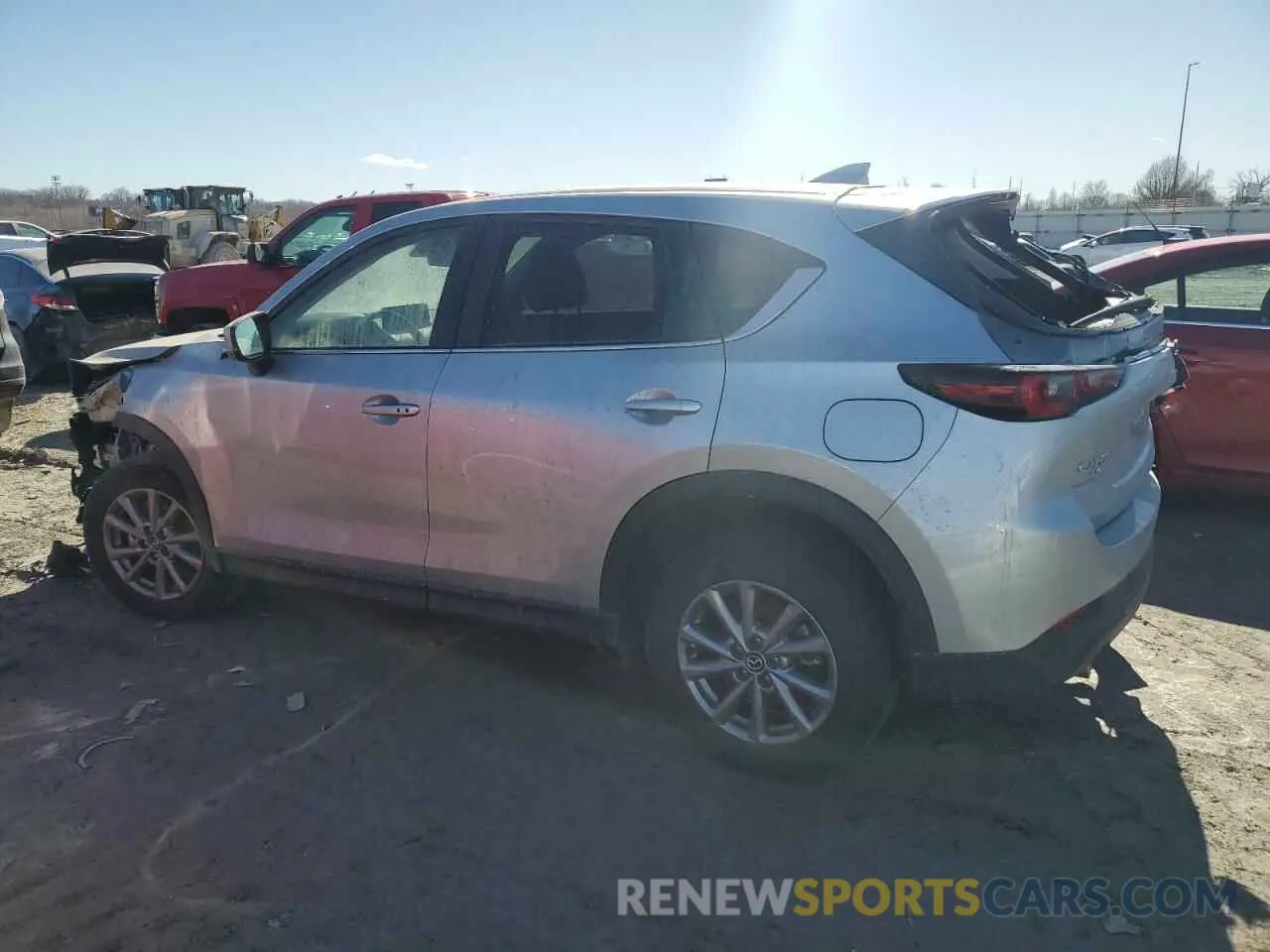 2 fotografías del automóvil dañado JM3KFBBMXN0544071 MAZDA CX-5 SELEC 2022