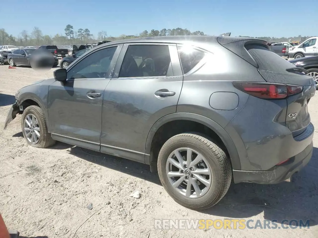 2 fotografías del automóvil dañado JM3KFBBM9P0106788 MAZDA CX-5 SELEC 2023