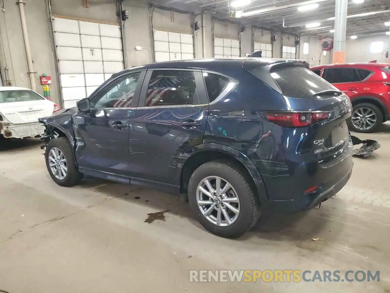 2 fotografías del automóvil dañado JM3KFBBL0R0465019 MAZDA CX-5 SELEC 2024
