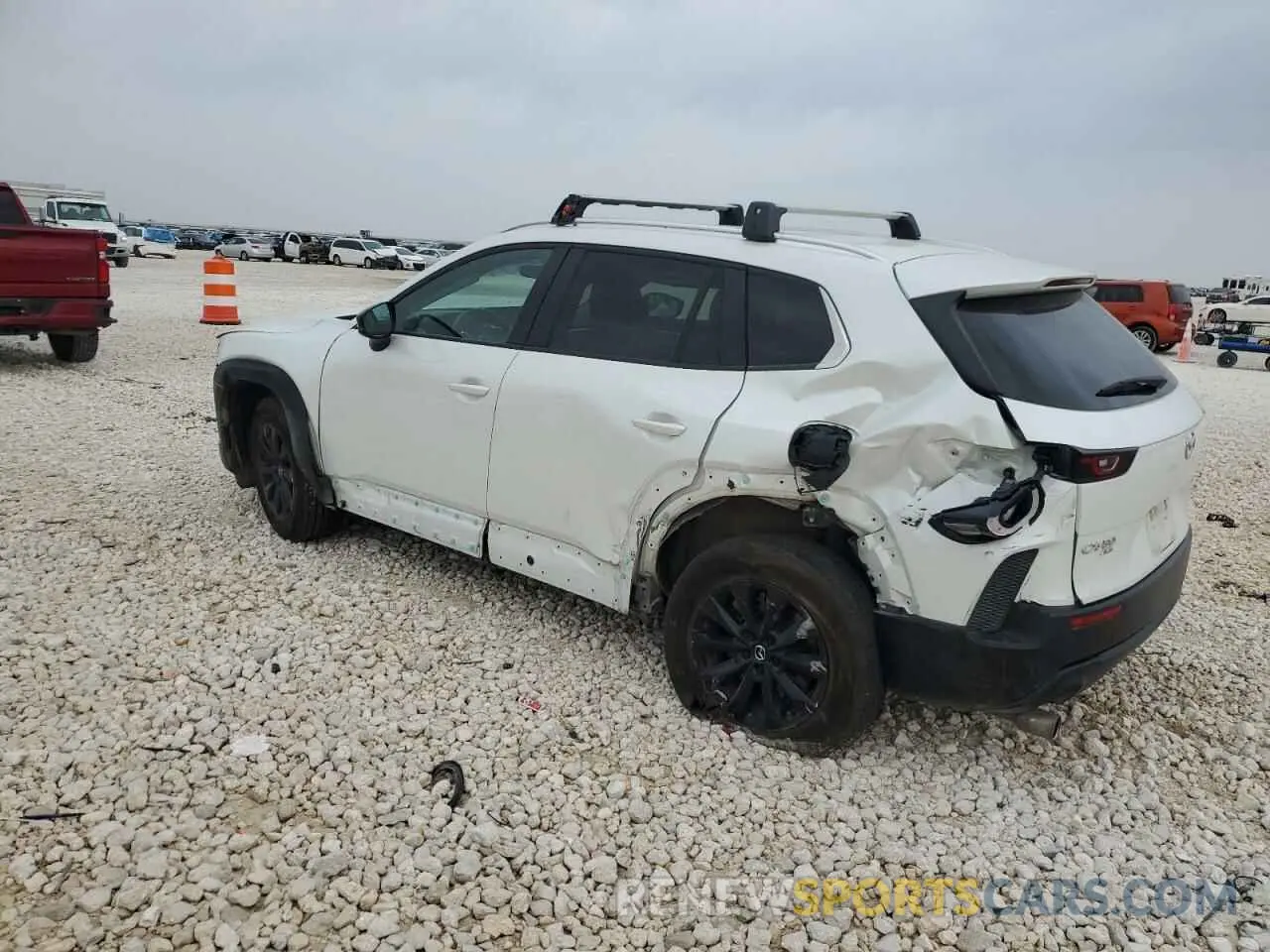 2 fotografías del automóvil dañado 7MMVABCM1PN105009 MAZDA CX-50 PREF 2023