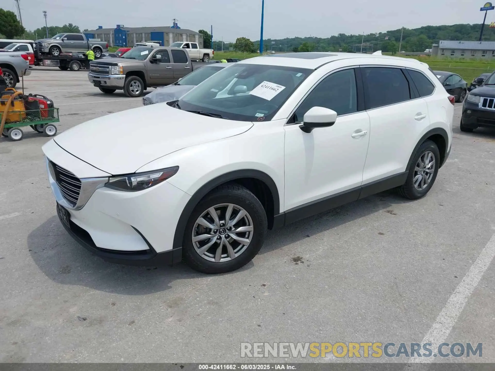 2 fotografías del automóvil dañado JM3TCACY1K0334804 MAZDA CX-9 2019