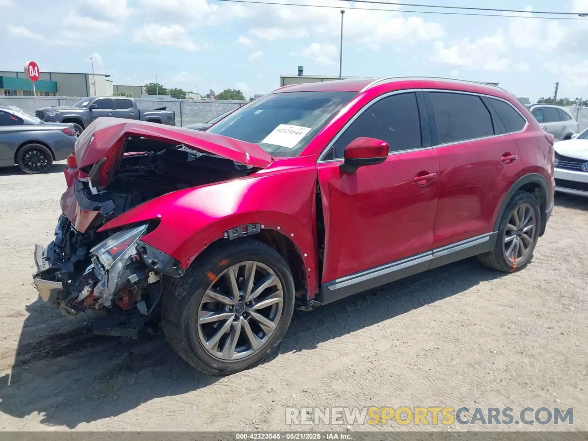 2 fotografías del automóvil dañado JM3TCADY5K0302436 MAZDA CX-9 2019