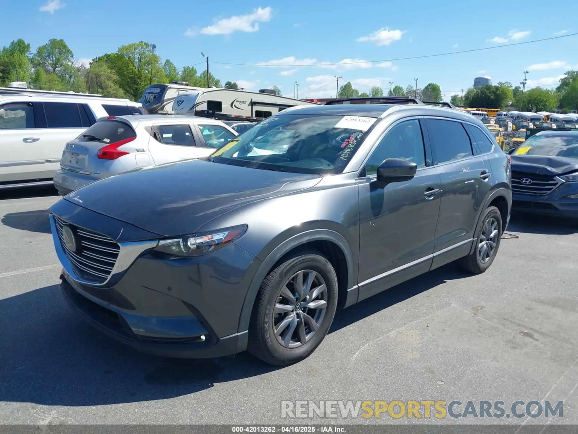 2 fotografías del automóvil dañado JM3TCACY7M0503484 MAZDA CX-9 2021