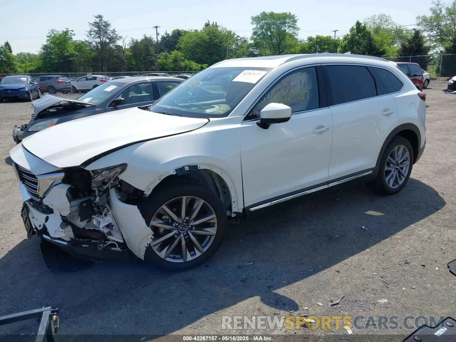 2 fotografías del automóvil dañado JM3TCBDY8M0537986 MAZDA CX-9 2021
