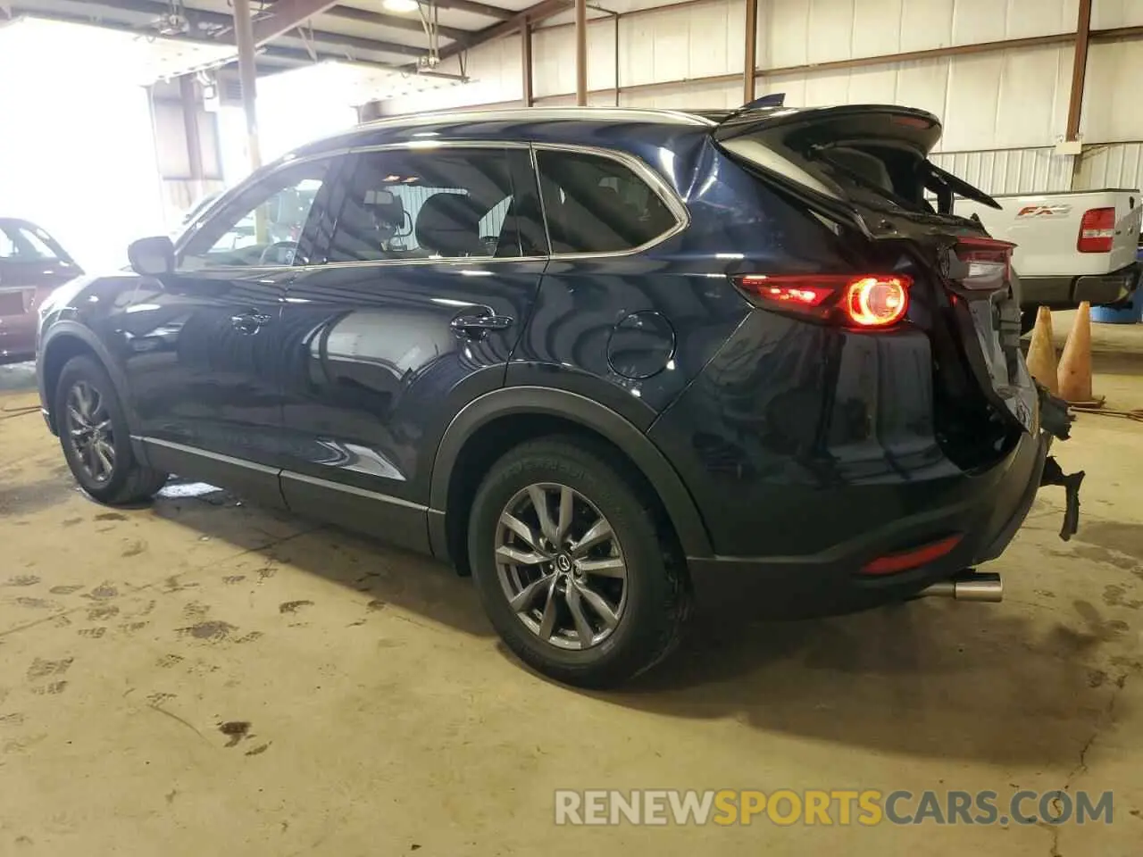 2 fotografías del automóvil dañado JM3TCBCY1P0655657 MAZDA CX-9 2023