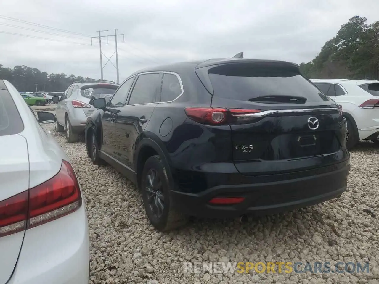 2 fotografías del automóvil dañado JM3TCBCYXP0657472 MAZDA CX-9 2023