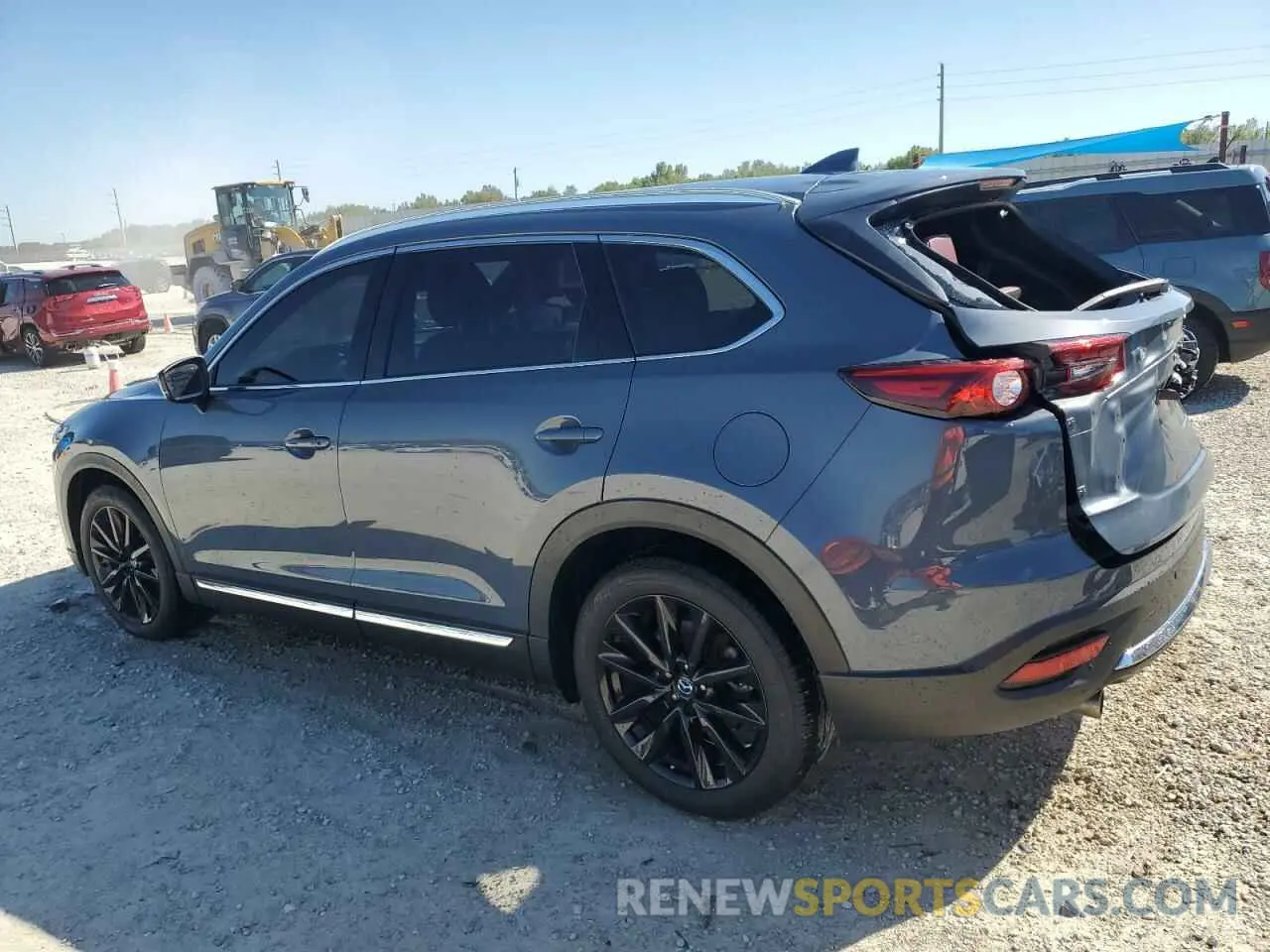 2 fotografías del automóvil dañado JM3TCBDY8P0653953 MAZDA CX-9 2023