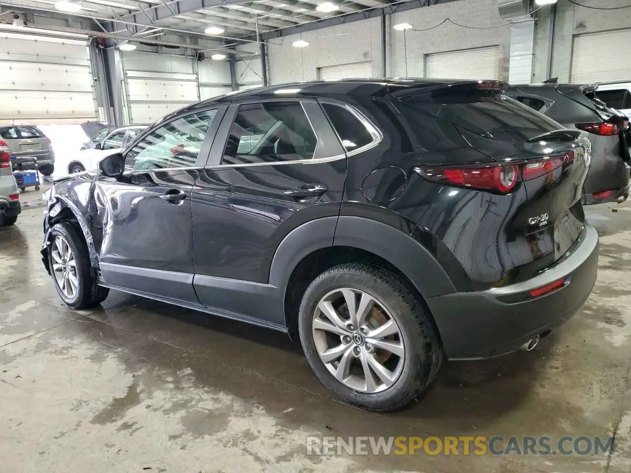 2 fotografías del automóvil dañado 3MVDMBCLXLM117155 MAZDA CX30 2020