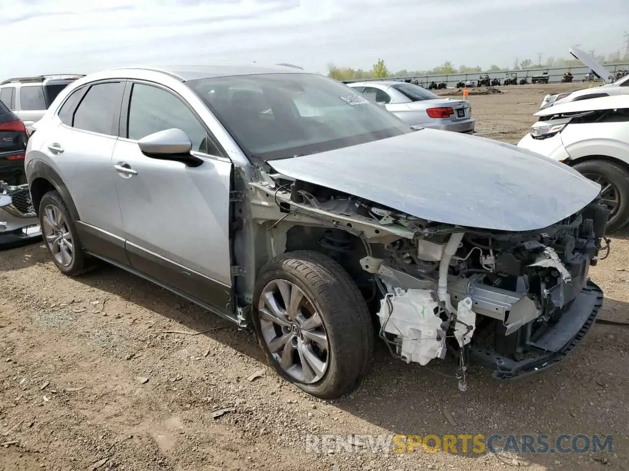 4 fotografías del automóvil dañado 3MVDMBCLXLM121349 MAZDA CX30 2020