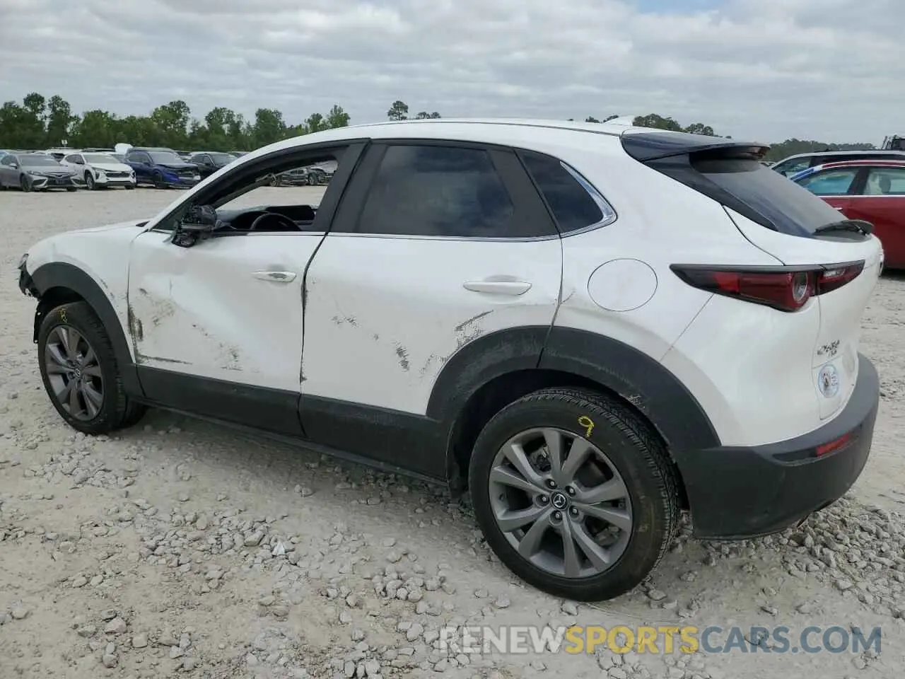 2 fotografías del automóvil dañado 3MVDMBDL2LM114068 MAZDA CX30 2020