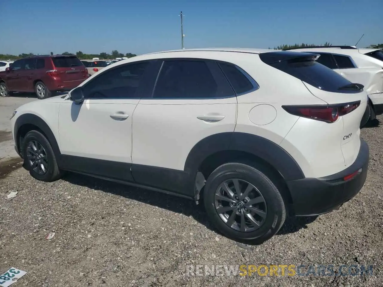 2 fotografías del automóvil dañado 3MVDMAAL2MM251639 MAZDA CX30 2021