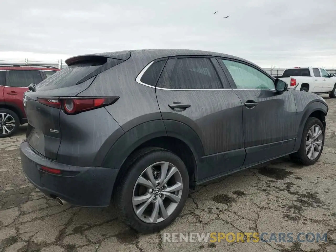 3 fotografías del automóvil dañado 3MVDMABL3MM220186 MAZDA CX30 2021