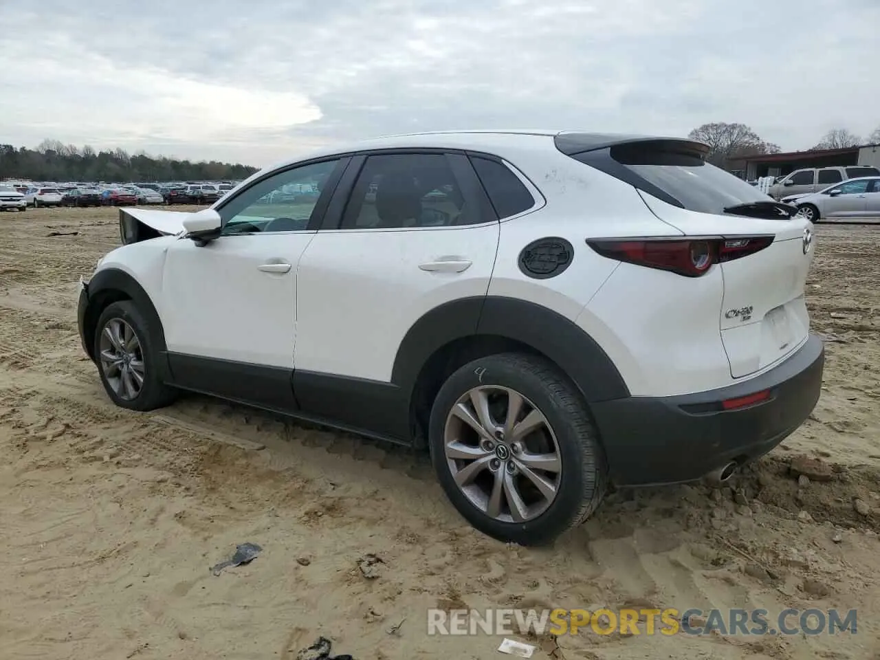 2 fotografías del automóvil dañado 3MVDMBBL1MM213629 MAZDA CX30 2021