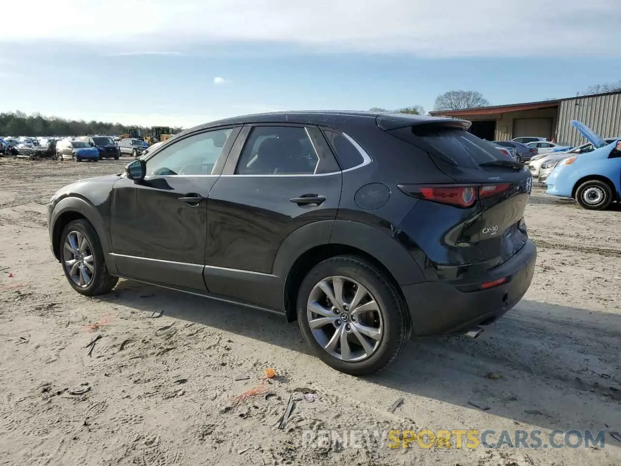 2 fotografías del automóvil dañado 3MVDMBBL1MM253743 MAZDA CX30 2021