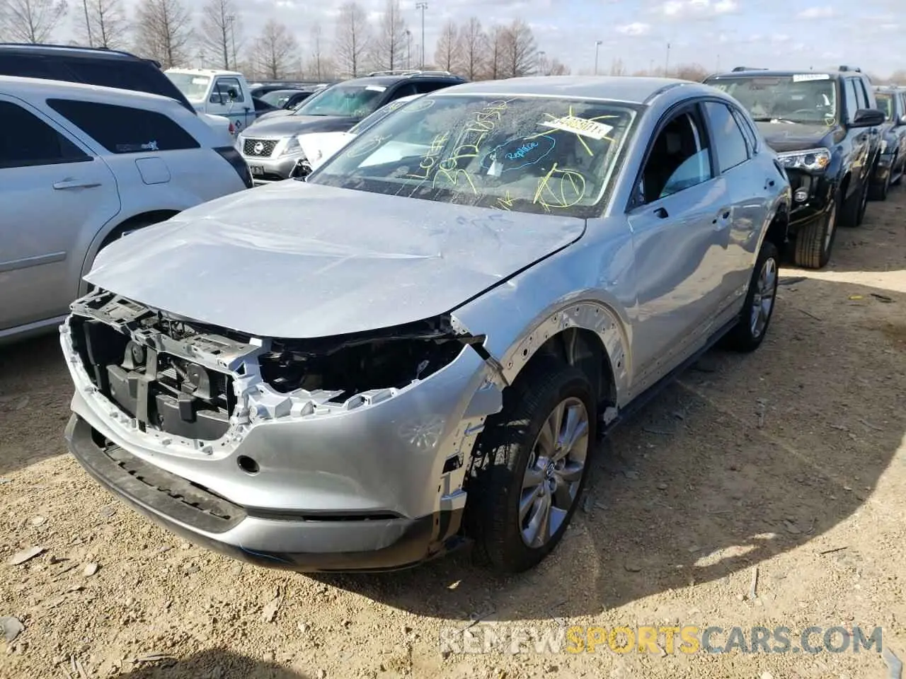 2 fotografías del automóvil dañado 3MVDMBBL1MM304920 MAZDA CX30 2021