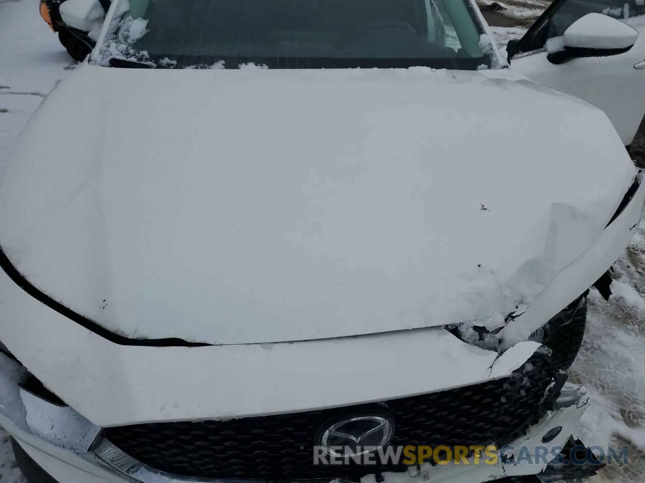 12 fotografías del automóvil dañado 3MVDMBCL2MM244256 MAZDA CX30 2021
