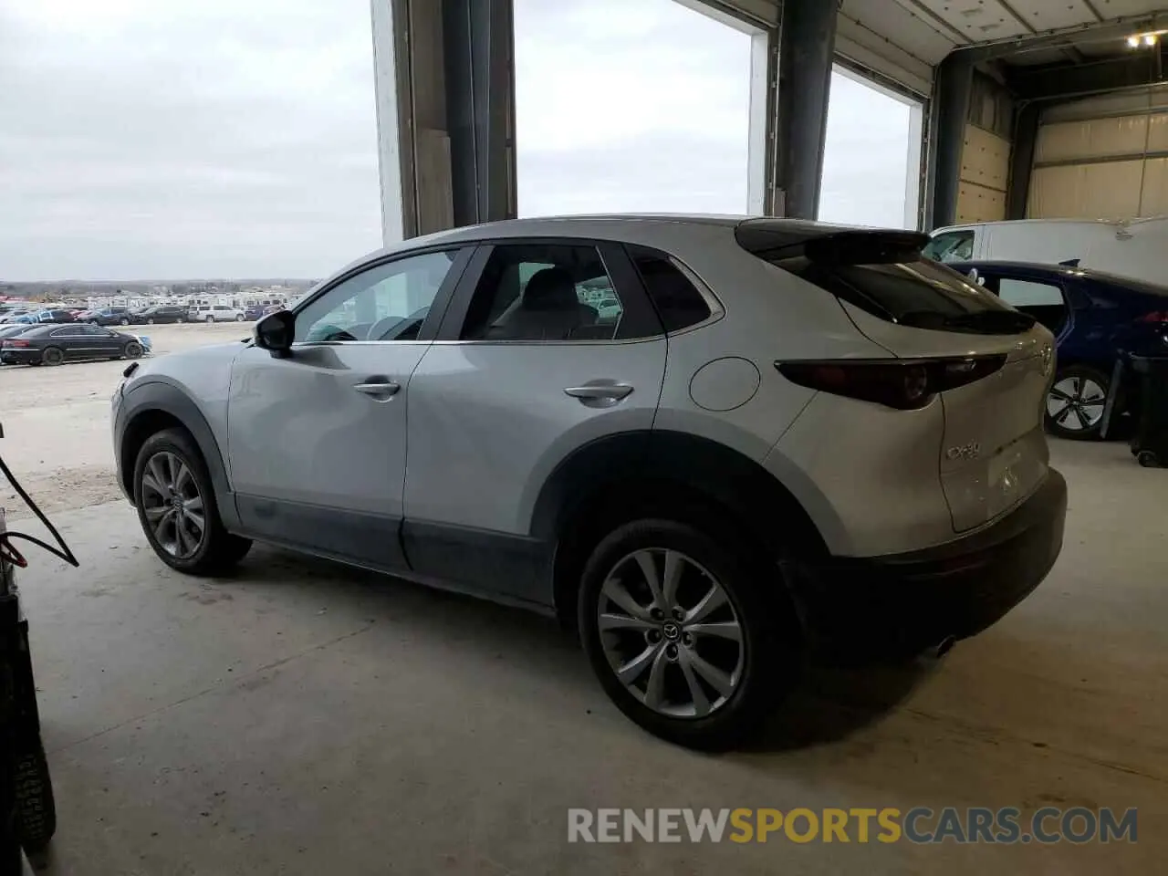 2 fotografías del automóvil dañado 3MVDMBCL5MM271404 MAZDA CX30 2021