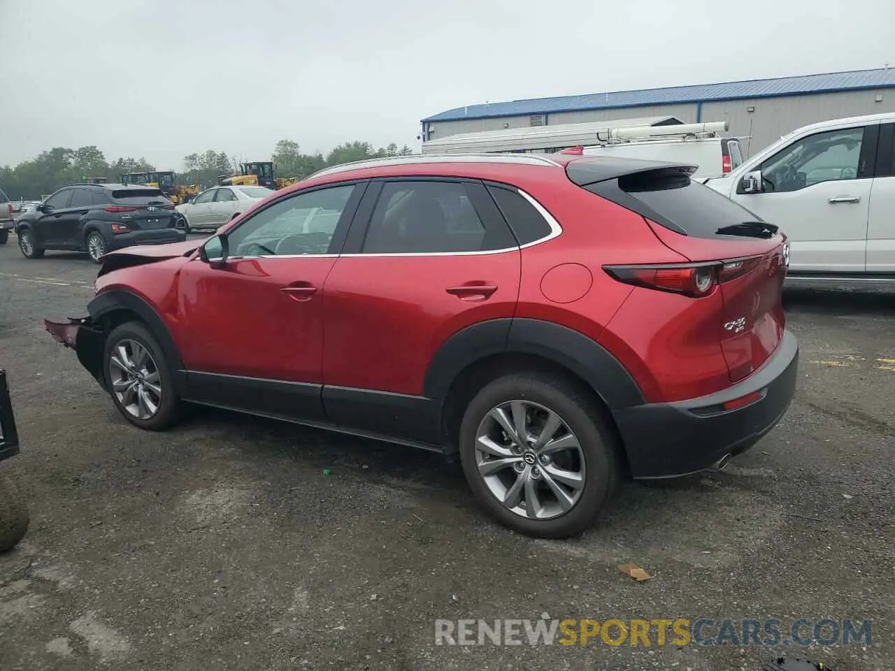 2 fotografías del automóvil dañado 3MVDMBDL5MM212318 MAZDA CX30 2021