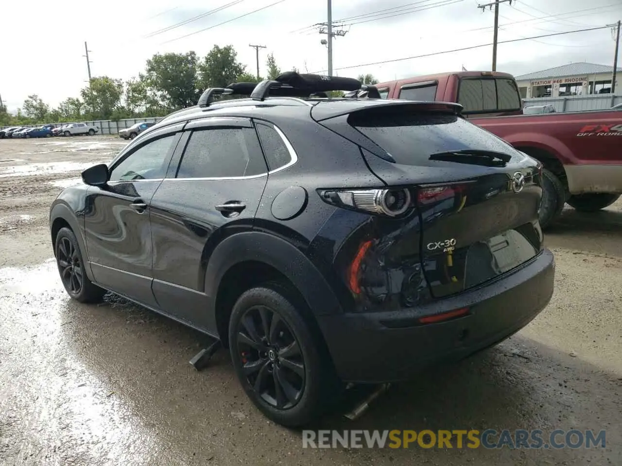 2 fotografías del automóvil dañado 3MVDMBDLXMM305142 MAZDA CX30 2021