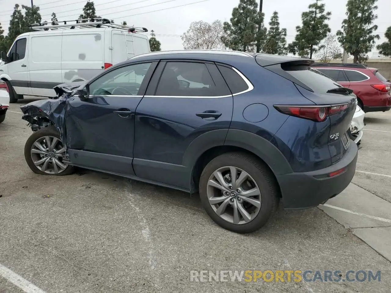 2 fotografías del automóvil dañado 3MVDMBCL4NM450891 MAZDA CX30 2022