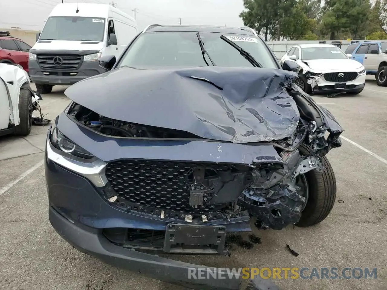 5 fotografías del automóvil dañado 3MVDMBCL4NM450891 MAZDA CX30 2022