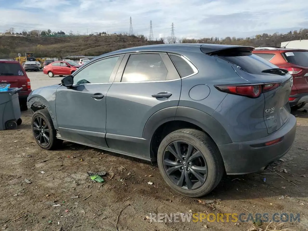 2 fotografías del automóvil dañado 3MVDMBCL7NM400941 MAZDA CX30 2022