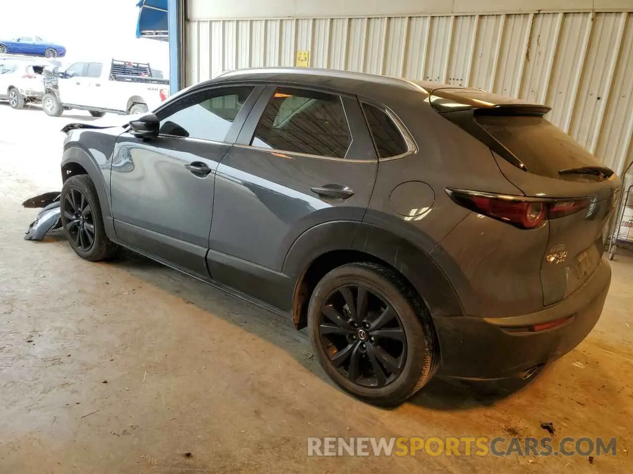 2 fotografías del automóvil dañado 3MVDMBCL8NM413021 MAZDA CX30 2022