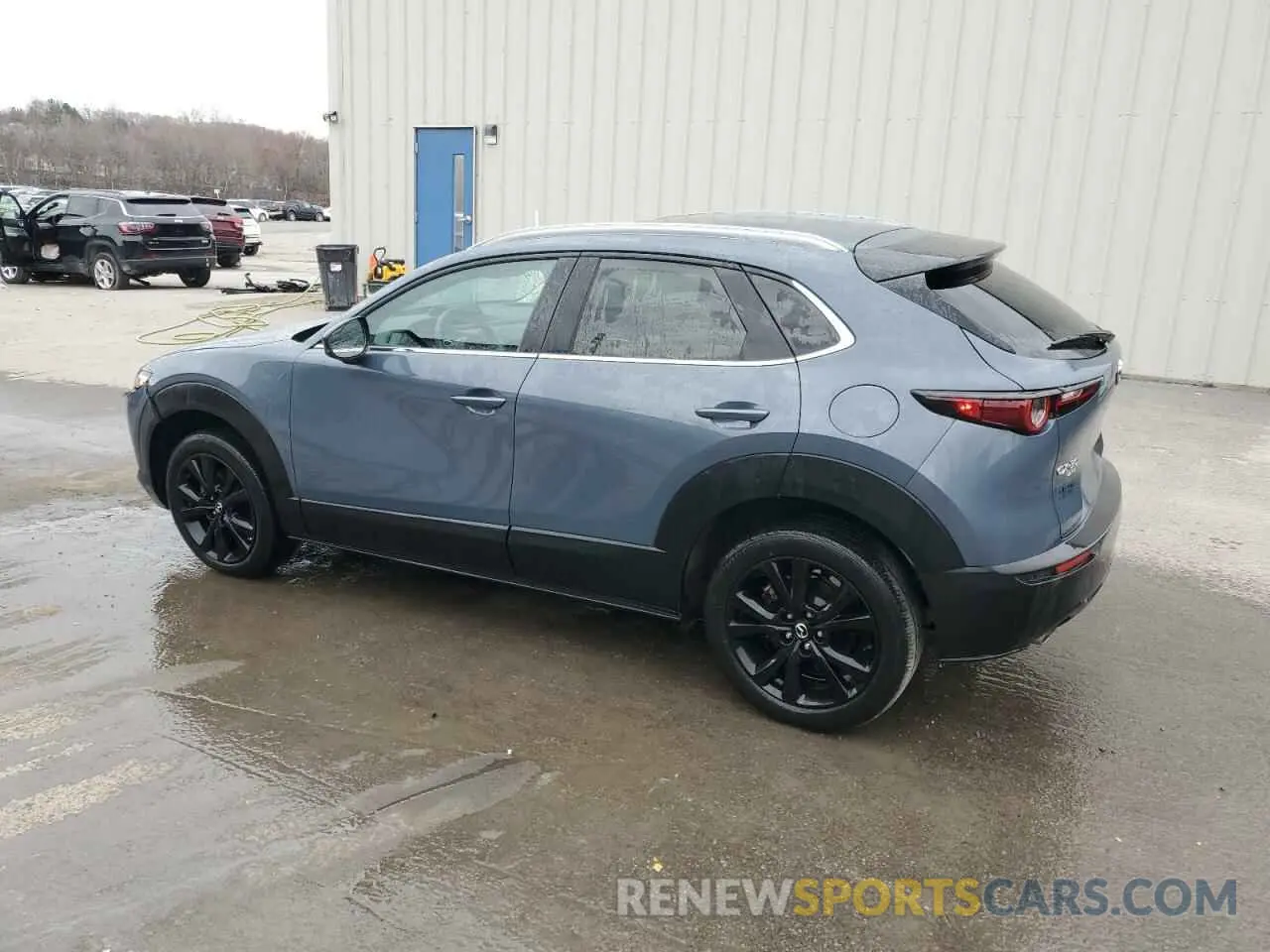 2 fotografías del automóvil dañado 3MVDMBCL9NM423198 MAZDA CX30 2022