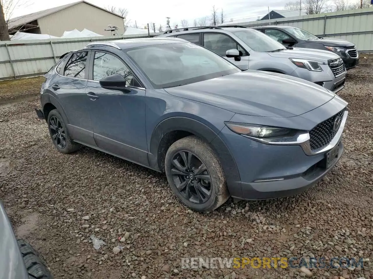 4 fotografías del automóvil dañado 3MVDMBCLXNM428913 MAZDA CX30 2022