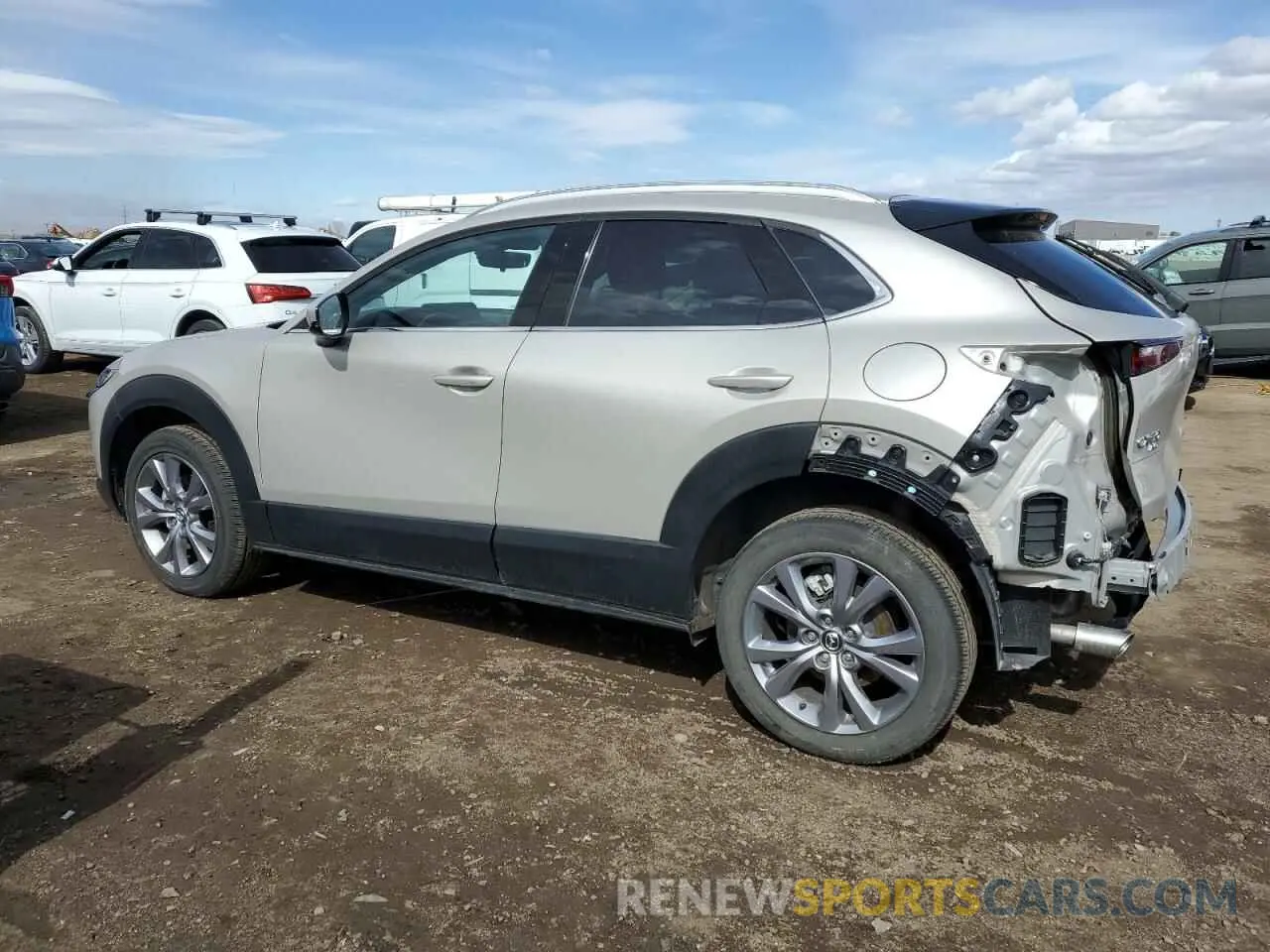 2 fotografías del automóvil dañado 3MVDMBDL4NM447276 MAZDA CX30 2022