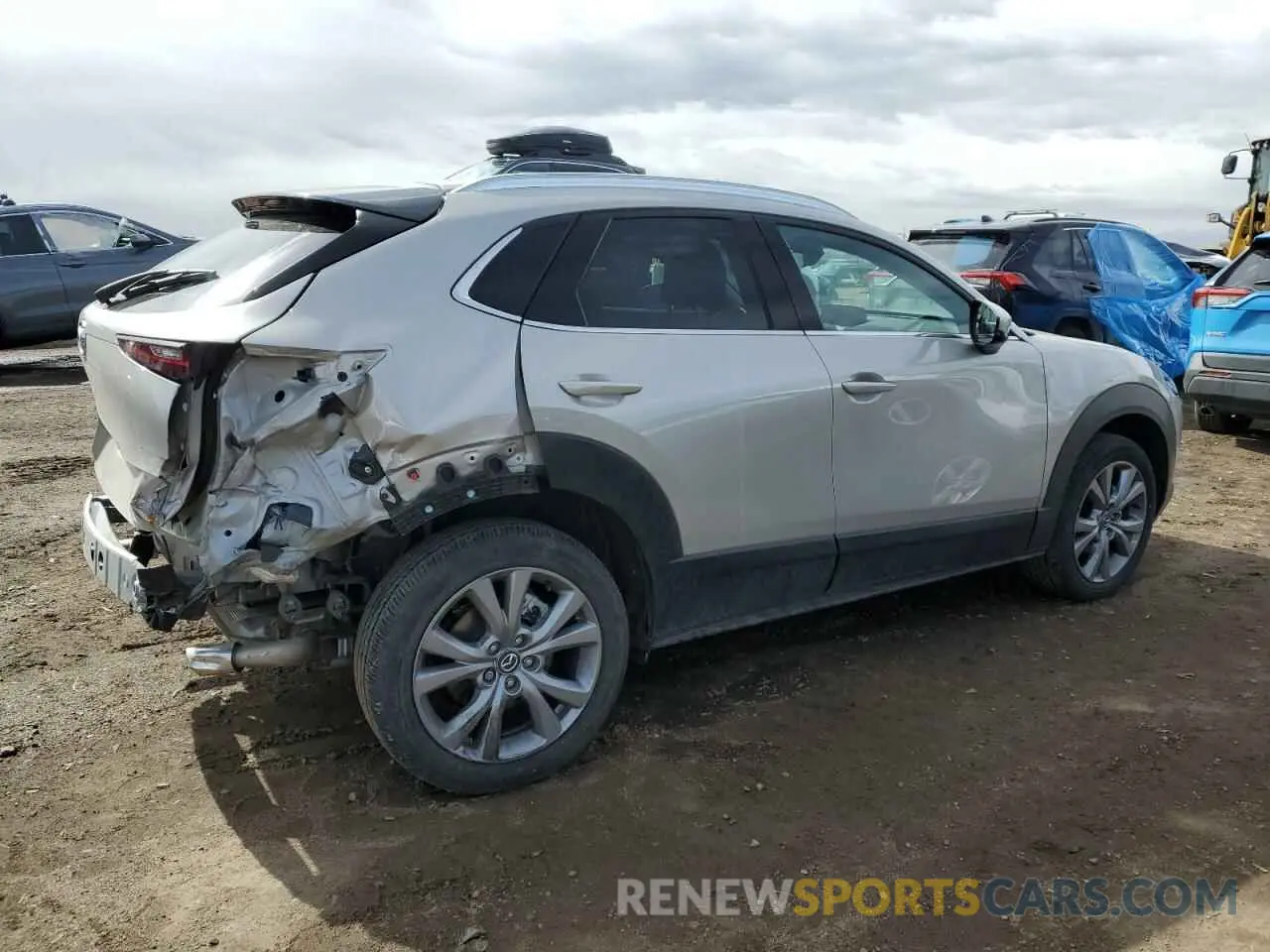 3 fotografías del automóvil dañado 3MVDMBDL4NM447276 MAZDA CX30 2022