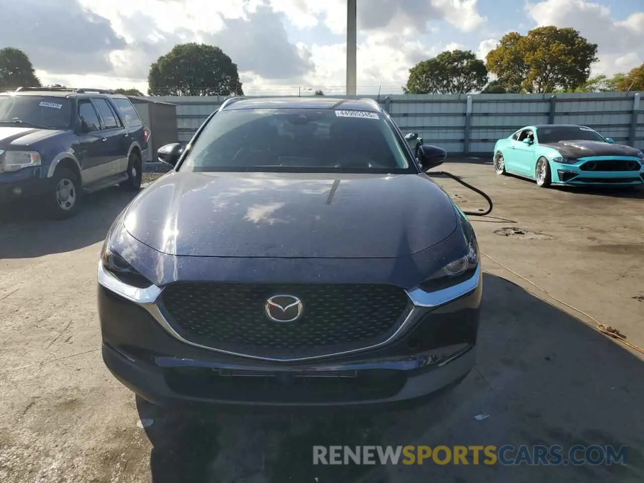 5 fotografías del automóvil dañado 3MVDMBDL6NM403456 MAZDA CX30 2022