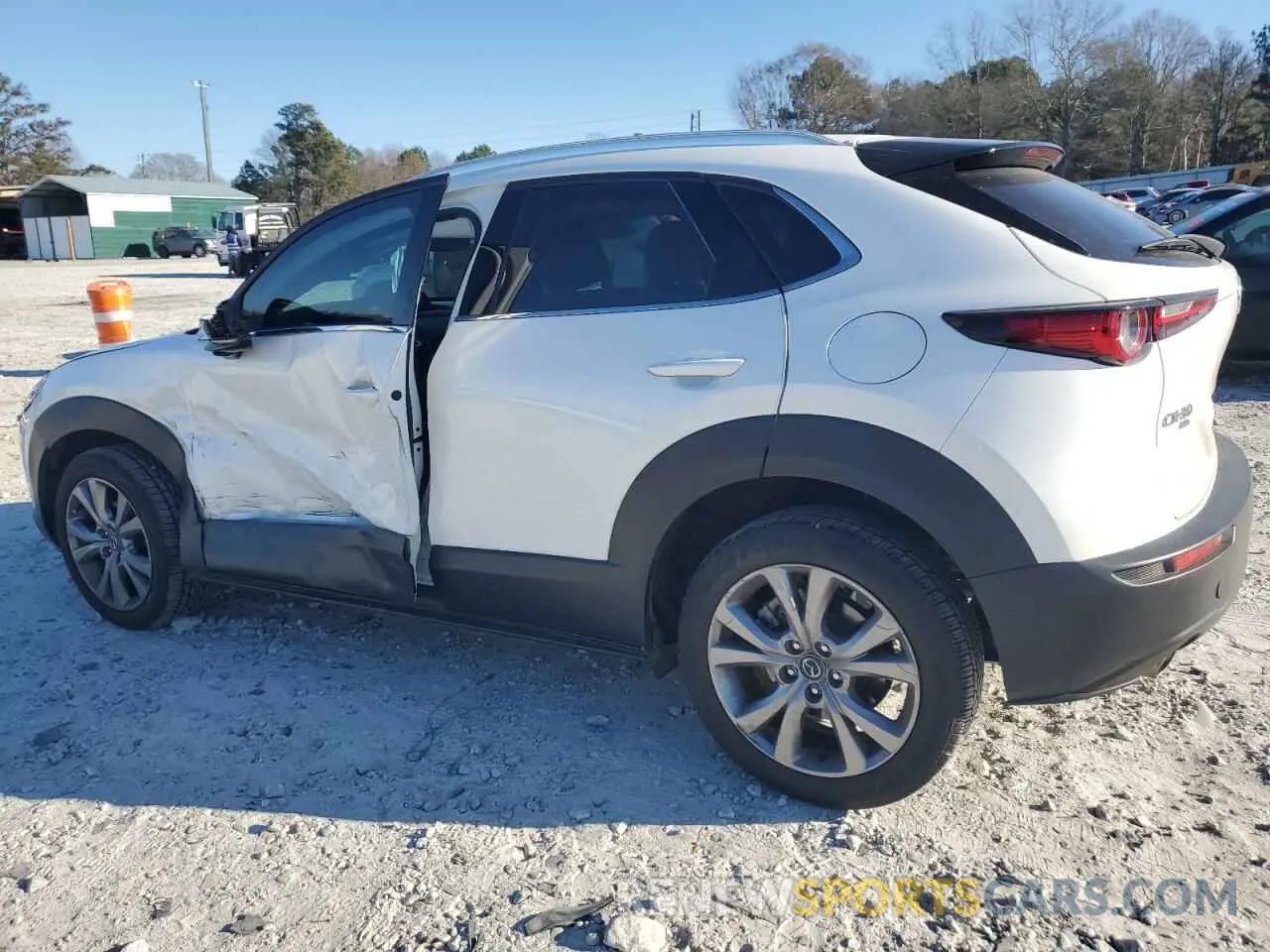 2 fotografías del automóvil dañado 3MVDMBDL8NM445479 MAZDA CX30 2022