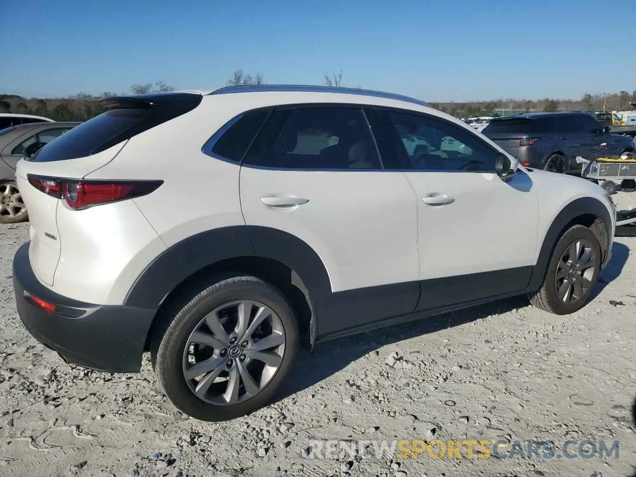 3 fotografías del automóvil dañado 3MVDMBDL8NM445479 MAZDA CX30 2022