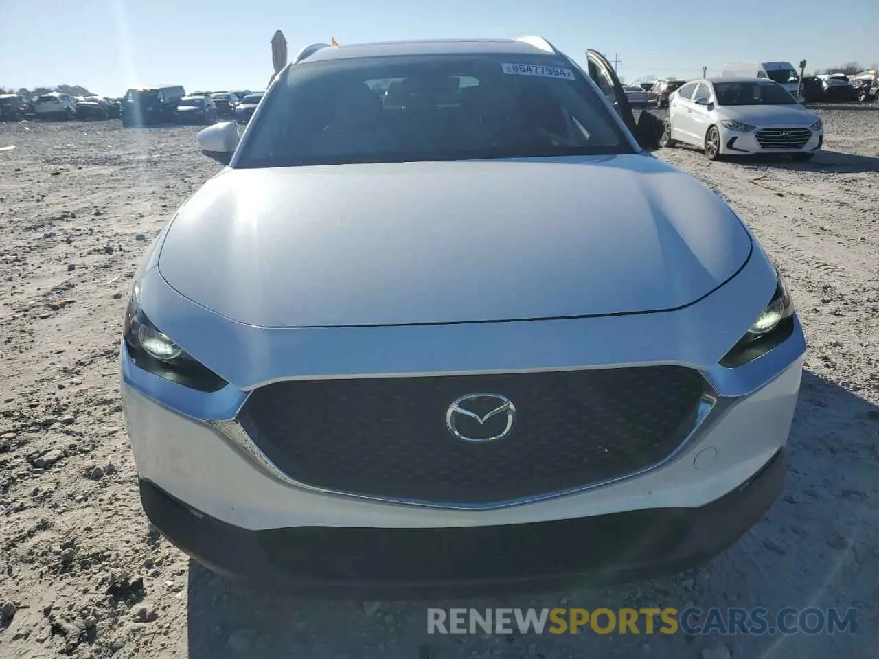 5 fotografías del automóvil dañado 3MVDMBDL8NM445479 MAZDA CX30 2022