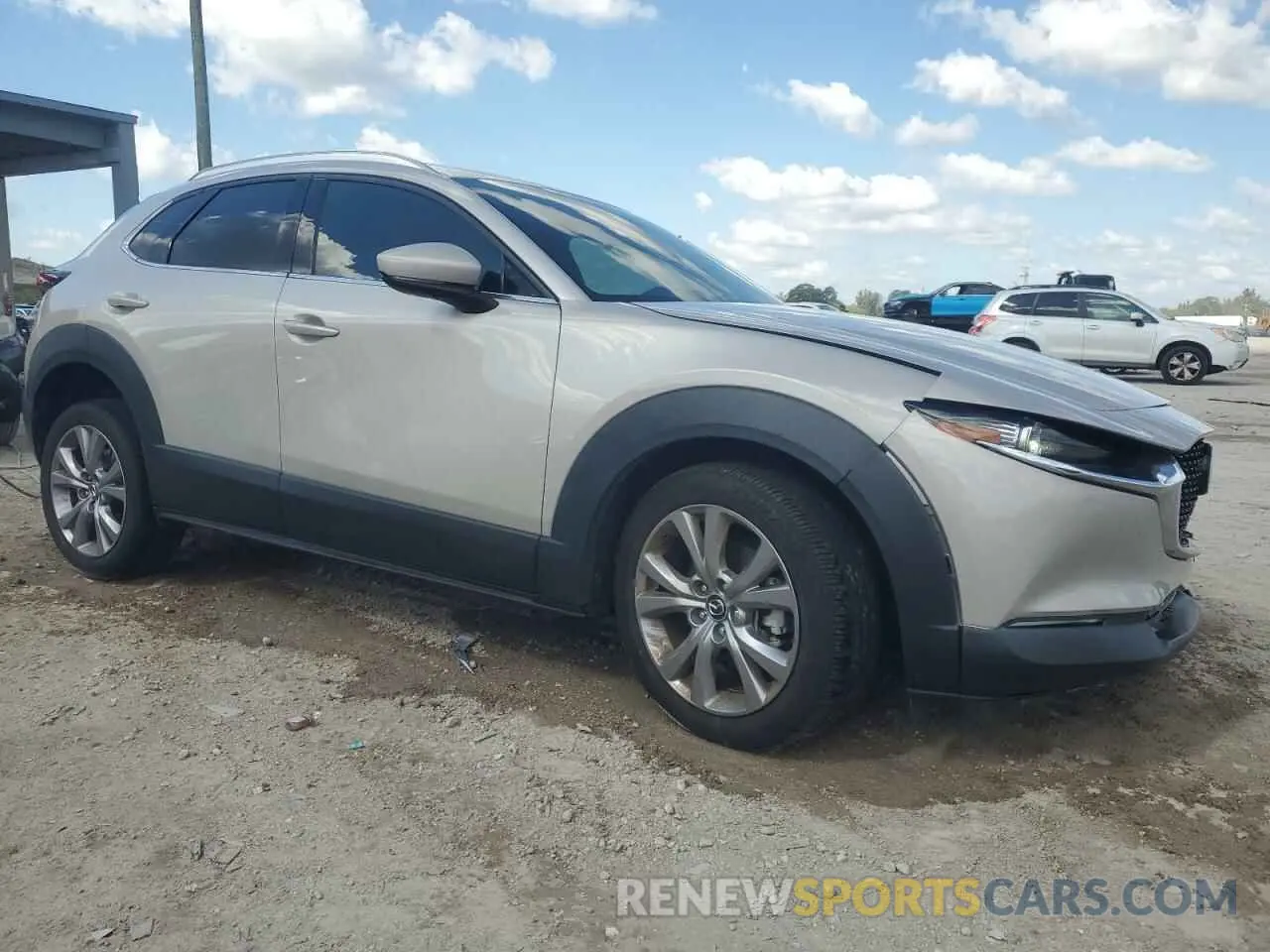 4 fotografías del automóvil dañado 3MVDMBDL9NM433759 MAZDA CX30 2022