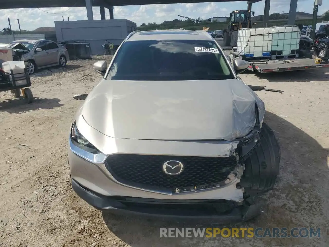 5 fotografías del automóvil dañado 3MVDMBDL9NM433759 MAZDA CX30 2022